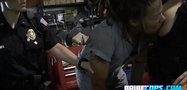  Kinky MILF with big tits are banging a BBC criminal in his workshop.